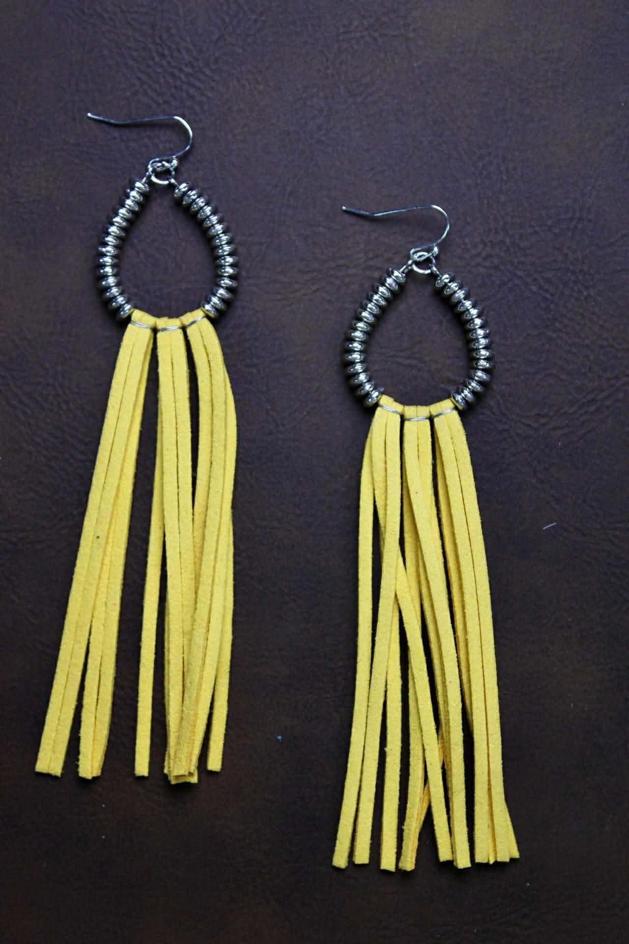 SPRING WITH LEATHER TASSEL EARRINGS