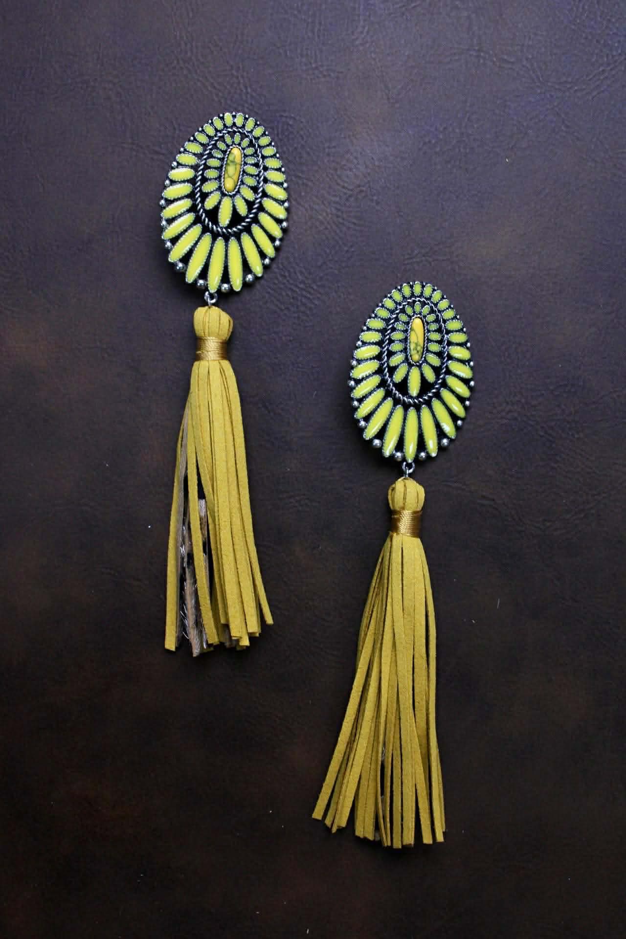 Squash with leather leopard tassels