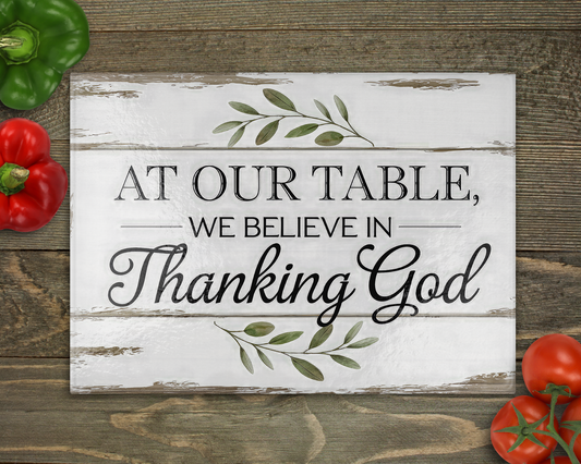 At our table thanking God Glass Cutting Board