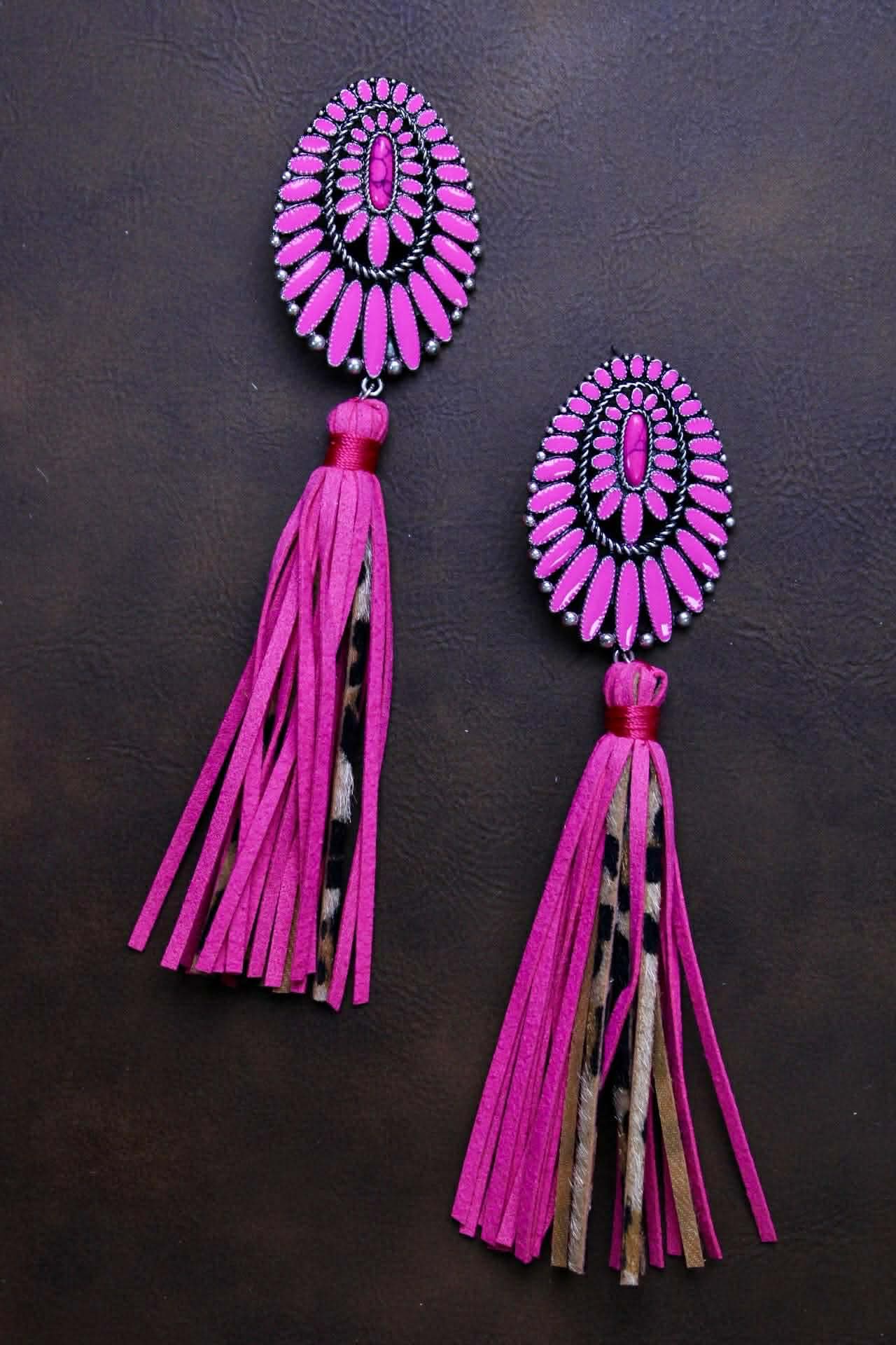 Squash with leather leopard tassels
