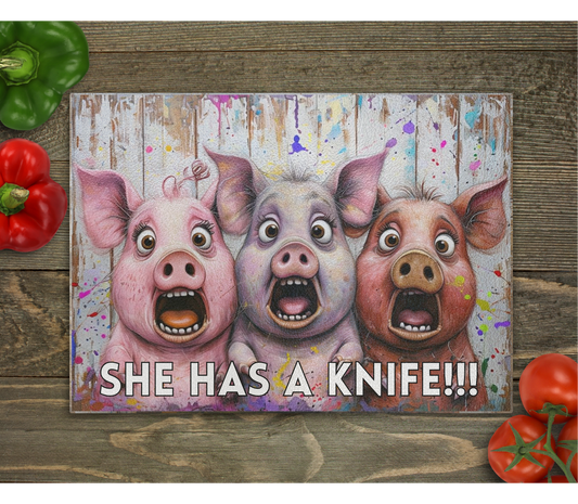 Scared Pigs "She has a kn!fe" Glass Cutting Board